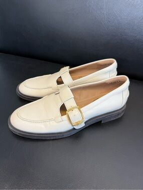 Sam Edelman Elaina T-Strap Buckle Loafer in ivory/cream leather. Size 8